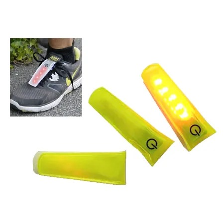 LED clip-on safety light attached to running shoe and shown in illuminated and off states