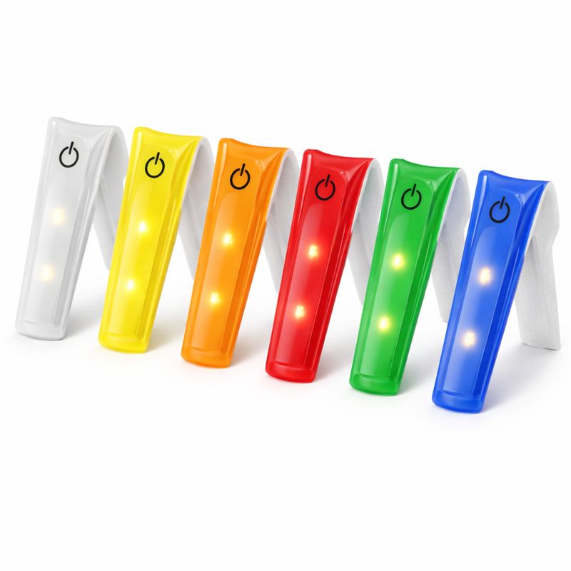 LED clip-on safety lights in multiple colors displayed on white background